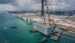 Singapore installs 227 concrete blocks in sea to build planet's largest automated port at Tuas