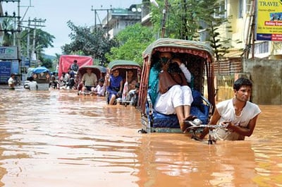 Assam- Heavy rain causes flood situation in Assam, Over 2 lakh people impacted.